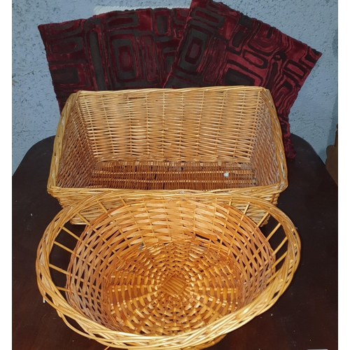 492 - A Mixed lot to include 2 Wicker Baskets, 2 cushions, a Lamp Shade and group of picture framed