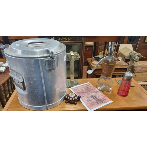 609 - A vintage Aluminium Steamer along with a vintage juicer and a pair of early 20th Century Candlestick... 