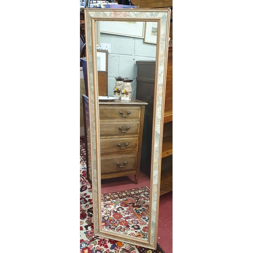 651 - A Rectangular Mirror in a floral frame.
130 x 40 cm approx.