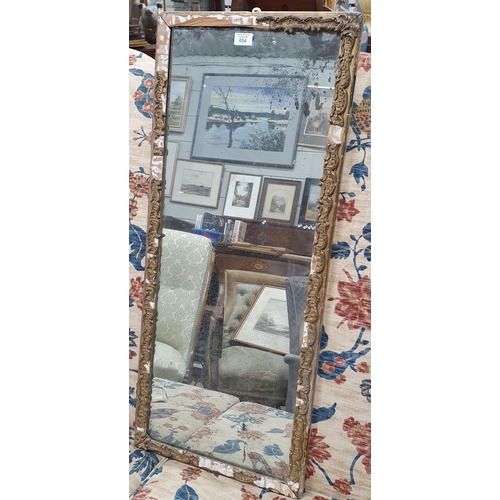 654 - A 19th Century Rectangular Mirror in a Gilt Frame.
90 x 39 cm approx.