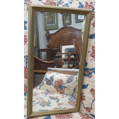 657 - A Rectangular Mirror.
60 x 36 cm approx.