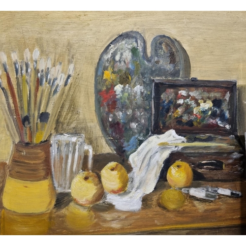 669 - A 20th Century Oil on Board still life of an artists table. Indistinctly signed LR. 38 x 48 cm appro... 