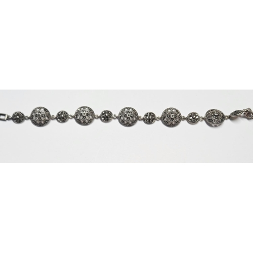 333 - A Silver and Marcasite Bracelet.