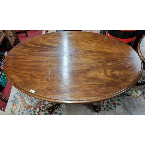 689 - A Victorian Mahogany Inlaid oval Supper Table.
H 70 x D99 x W129  cm approx.