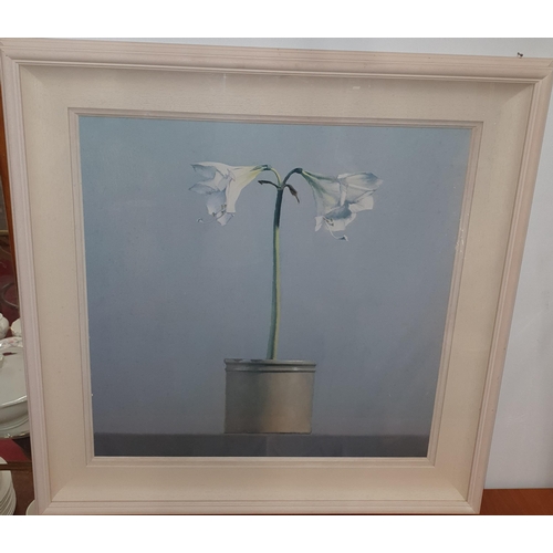 719 - A coloured Print still life of Lilies in a pot in a cream coloured frame.
H 79 x 79 cm approx.