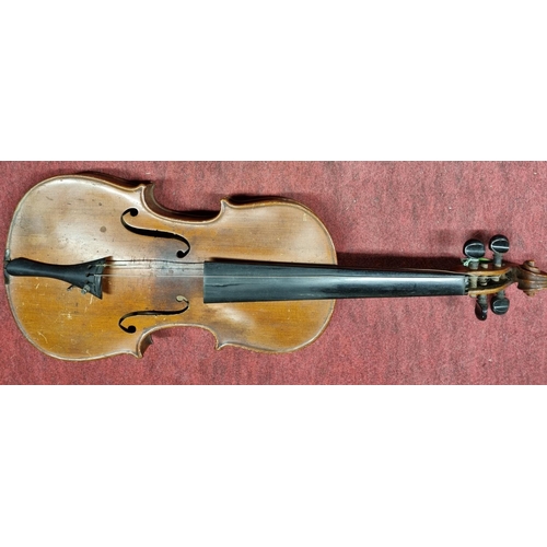 772 - Sold on Behalf of Charity, uncollected Lot.
Joseph Guarnerius fecit. A cased Violin with bow. 19th C... 