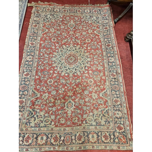 790 - A Red ground Carpet with all over design. 220 x 140 cm approx.