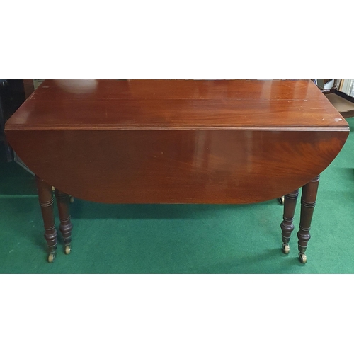 761 - A good 19th Century Mahogany two leaf Dining Table with drop ends with unusual mechanism, on turned ... 