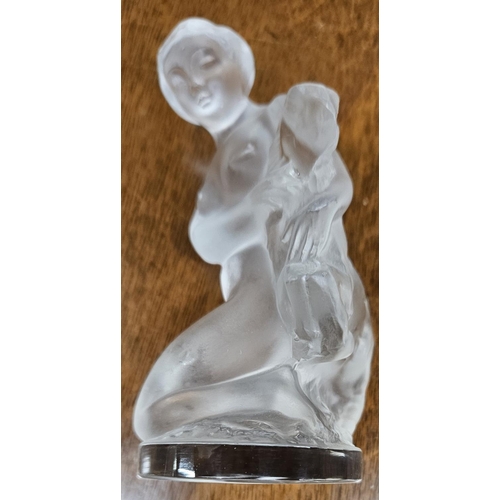 362 - A Lalique Figure of a young Girl with makers name stamped to the base. H 11.5 cm approx.