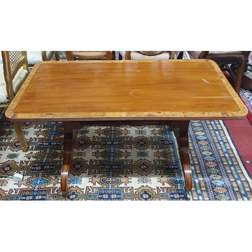 851 - A modern Mahogany and crossbanded Coffee Table. 108 x 55 x H 57 cm approx.