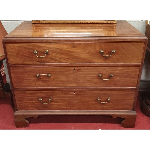 14 - A good Georgian Mahogany Chest Of Drawers with three long drawers and original swan neck handles on ... 