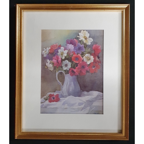 24 - A 20th Century colour Print of flowers in a vase.
31 x 26 cm approx.