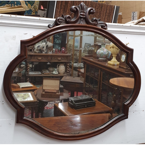 36 - A 19th Century Mahogany wall Mirror with cartouche top. 68 x 65 cm approx.