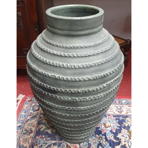 39 - A very large Pottery Vase with ribbed outline.
H 61 cm approx.