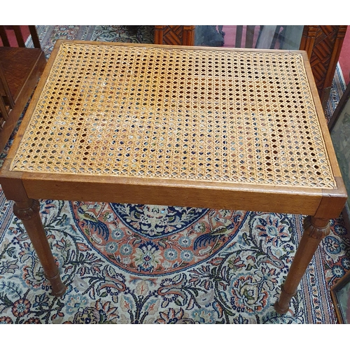 62 - An early 20th Century Mahogany rectangular Stool with cane work seat and turned supports.
53 x 38 x ... 