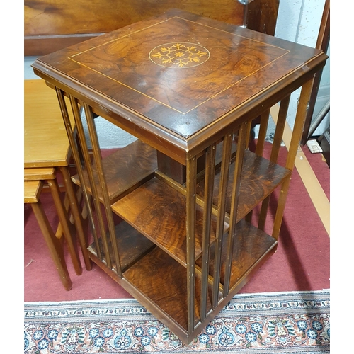 64 - A reproduction Walnut revolving Bookcase.
47 x 47 x H 80 cm approx.