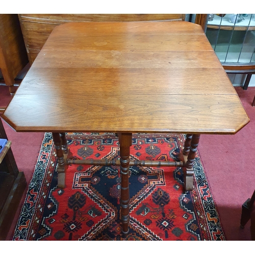 161 - A 19th Century Walnut Sutherland Table on turned supports and stretcher base. 76 x 92 x H 107 cm app... 