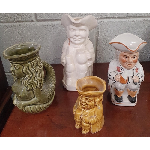 195 - A 19th Century blue ground Bowl along with a group of four 19th Century Toby Jugs.