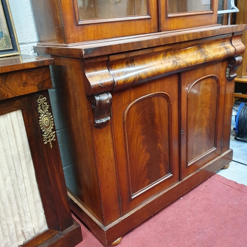 204 - Of Superb quality. A Victorian Mahogany two door Bookcase. W 120 x 47 x H 220 cm approx.