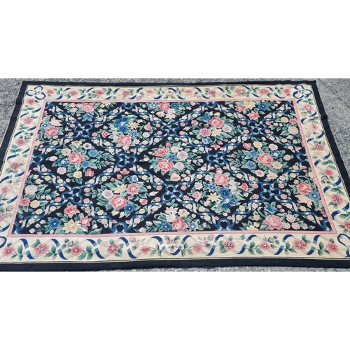 752 - A good Aubusson design Carpet/Wall Hanging with black ground and floral design. 274 x 183 cm approx.