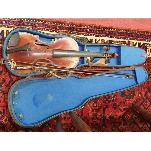 1202 - A good early 20th Century Violin in a case.
L 59 cm approx.