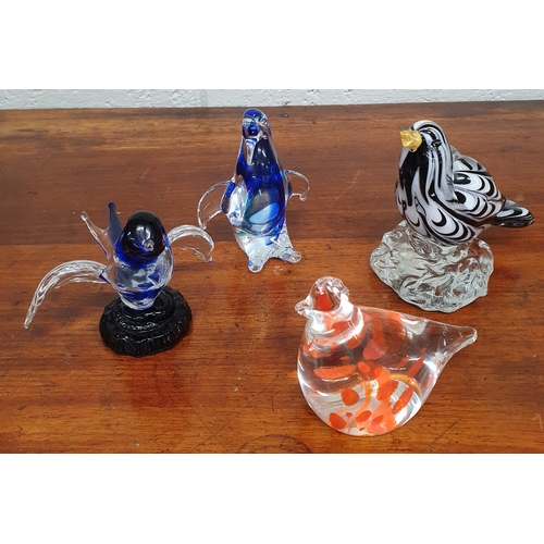 276 - A group of Art Glass pieces to include Caithness depicting birds. Tallest being 12 cm approx.