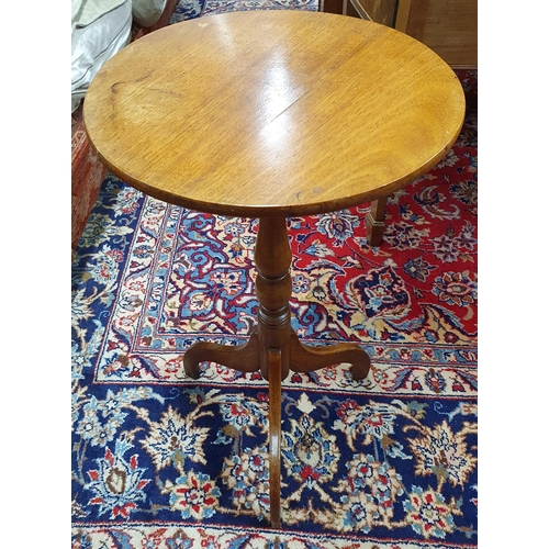 423 - A 19th Century Mahogany circular Wine Table on turned shaft with tripod supports. D 42 x H 72 cm app... 