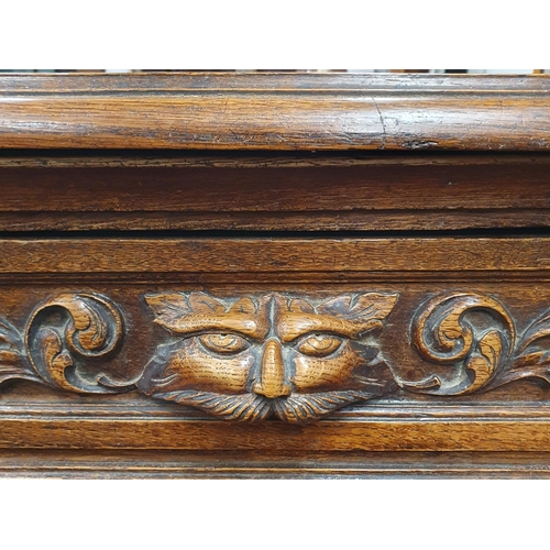 444 - A 19th Century, possibly earlier, Oak Buffett on turned barley twist supports with double frieze dra... 