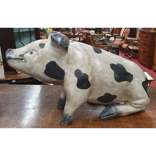 445 - A good heavy Timber Figure of a spotted Pig. L 51 x H 32 cm approx.