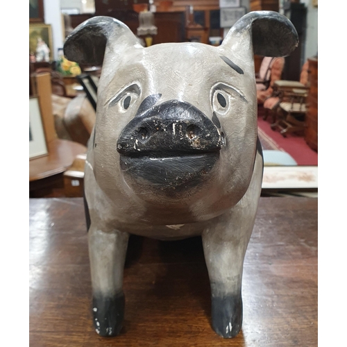 445 - A good heavy Timber Figure of a spotted Pig. L 51 x H 32 cm approx.