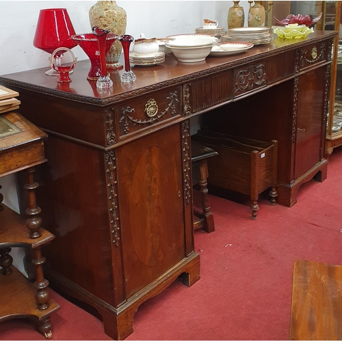 452 - A good 19th Century Mahogany Pedestal Sideboard with highly carved front on bracket feet. 190 x 63 x... 