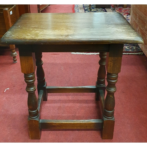 459 - A 20th Century Oak Milking Stool along with a twin division magazine rack. 43 x 30 x H 47, 50 x 24 x... 