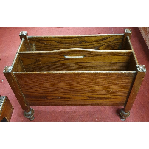 459 - A 20th Century Oak Milking Stool along with a twin division magazine rack. 43 x 30 x H 47, 50 x 24 x... 