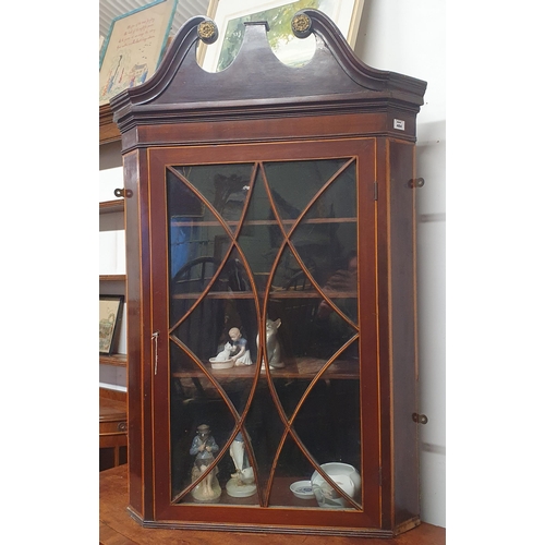 484 - An early 19th Century Mahogany and inlaid wall mounted corner Unit with architectural top pediment. ... 