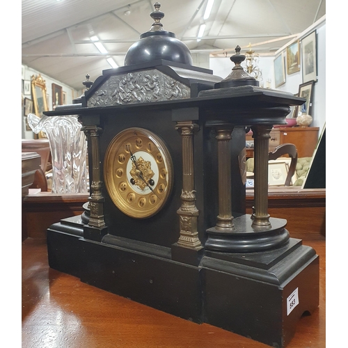 553 - A 19th Century black slate and marble Mantel Clock with reeded columned outline. 44 x 13 x H 43 cm a... 