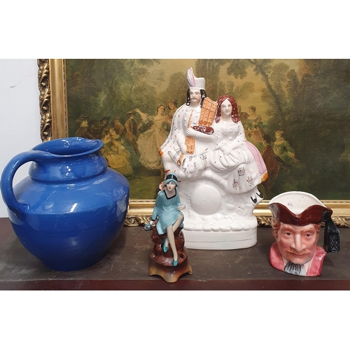 628 - A 19th Century Flatback Staffordshire Figure, a hand painted ostrich Egg, a Toby Jug and other items... 