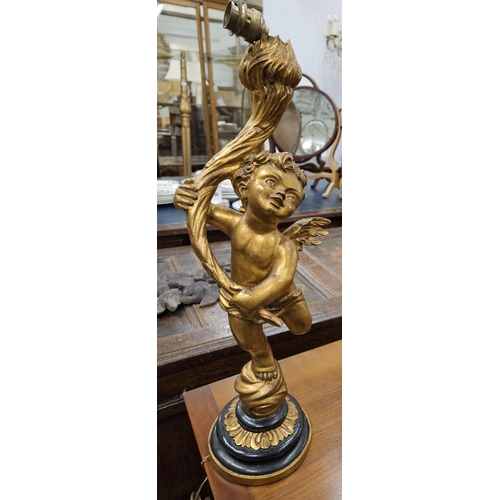 980 - A good Table Lamp depicting a cherub holding a light. H 53 cm approx.