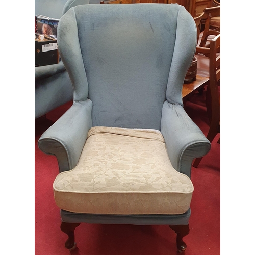 567 - A good pair of wingback Chairs on cabriole supports. W 75 x SH 49 x BH 104 cm approx.