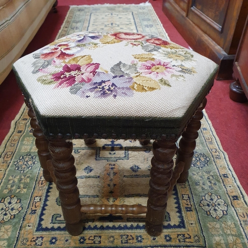 575 - A 20th Century hexagonal Stool with tapestry upholstery. W 40 x H 35 cm approx.