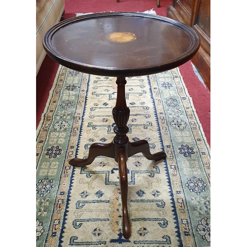 580 - A Mahogany and Inlaid Wine Table. D 34 x H 51 cm approx.