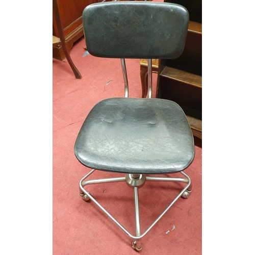 583 - A retro Swivel Chair.