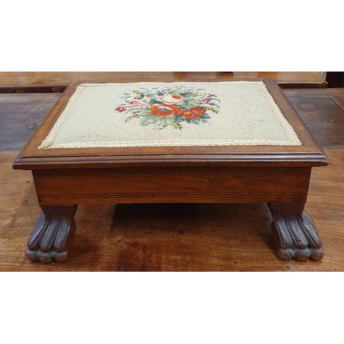 597 - An early 20th Century Mahogany rectangular Stool with tapestry upholstered seat. 38 x 27 x H 16 cm a... 