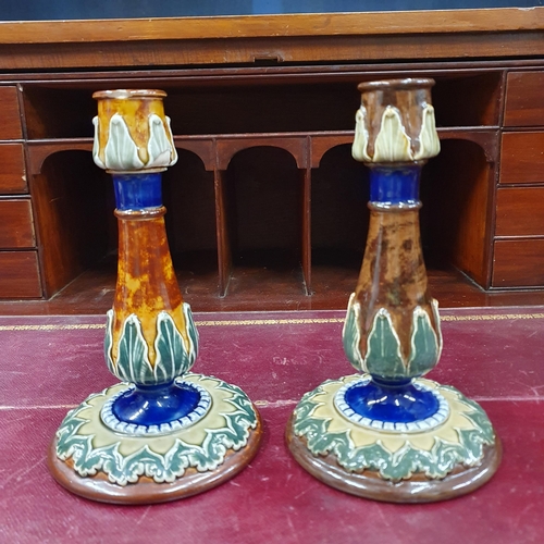 601 - A good pair of 19th Century Royal Doulton salt glaze Candlesticks. H 19 cm approx.