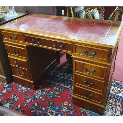 617 - A reproduction Yew wood Desk. 120 x 60 x H 79 cm approx.