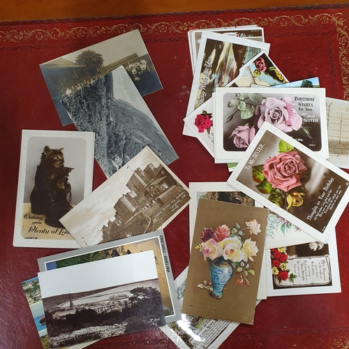 619 - A large quantity of vintage Postcards.