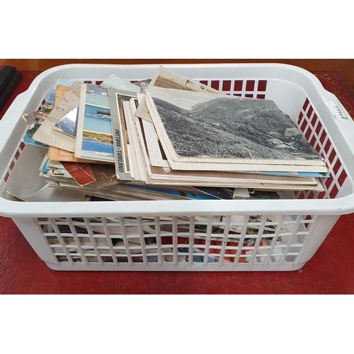 619 - A large quantity of vintage Postcards.