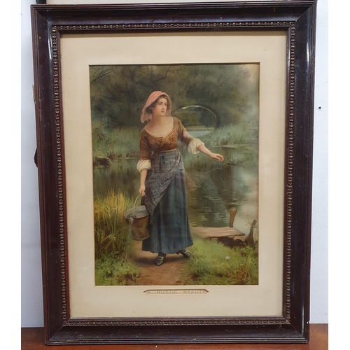 647 - 'A Rustic Beauty' A 19th Century colour Print of a woman fetching a pail of water. 64 x 51 cm approx... 