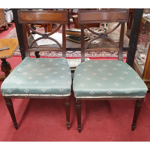 662 - A good pair of Regency Mahogany dining Chairs on turned reeded supports and X-frame stretcher backs.... 