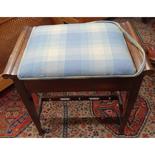 675 - An early 20th Century Walnut piano Stool. 55 x 35 x H 51 cm approx.