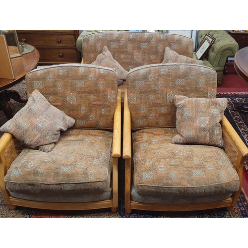 676 - A good Ercol three piece Berger Suite with cane oak sides. W 139 x D 86 cm approx.